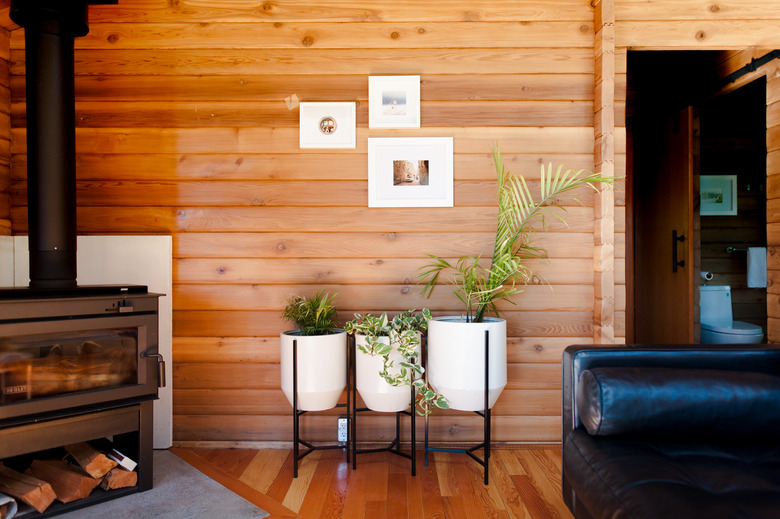 White plant containers on stands