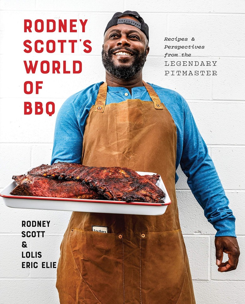 cookbook cover featuring Rodney Scott holding BBQ with text that reads Rodney Scott's World of BBQ