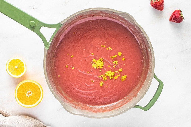 Strawberry citrus curd in a saucepan