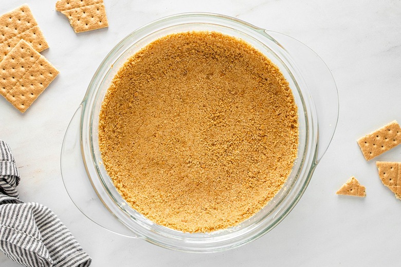 Graham cracker crust in a deep pie dish