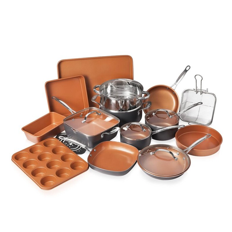 Rust-colored ceramic cookware set with baking accessories
