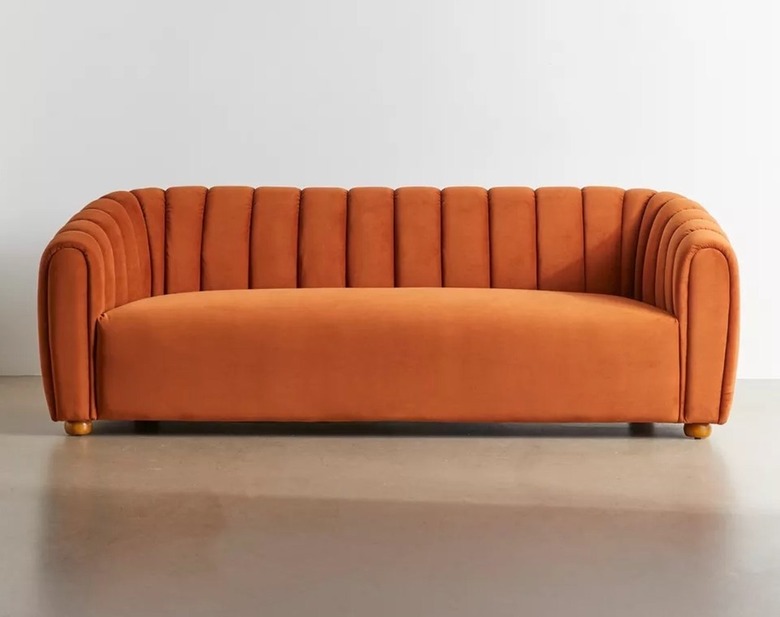 Orange velvet sofa