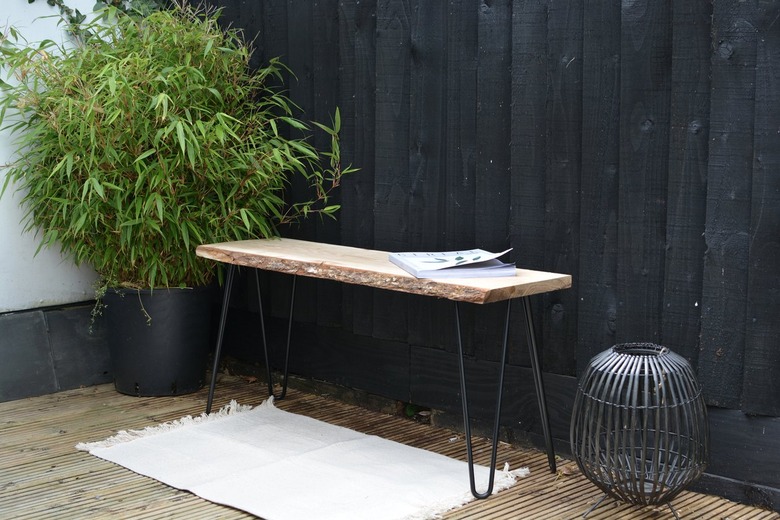 Outdoor rustic wood bench with hairpin legs
