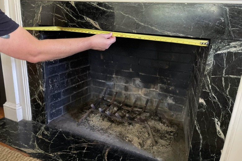 Measuring opening of fireplace