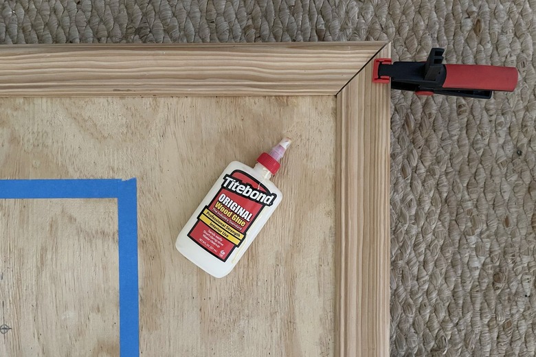 Gluing chair rail molding to plywood and clamping it down