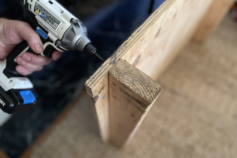 Attaching 2x4 wood boards to plywood panel with power drill