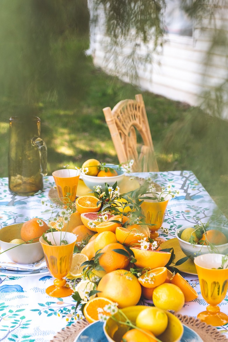 summer flower arrangement idea with fruit for the tablescape