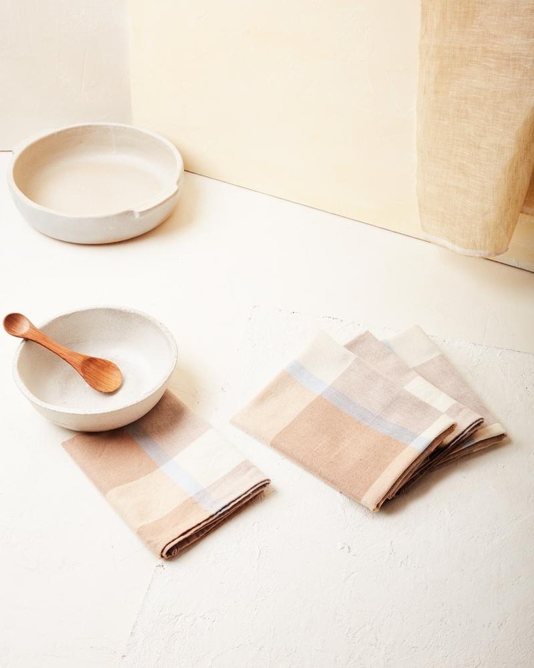 bowls with patterned napkins nearby
