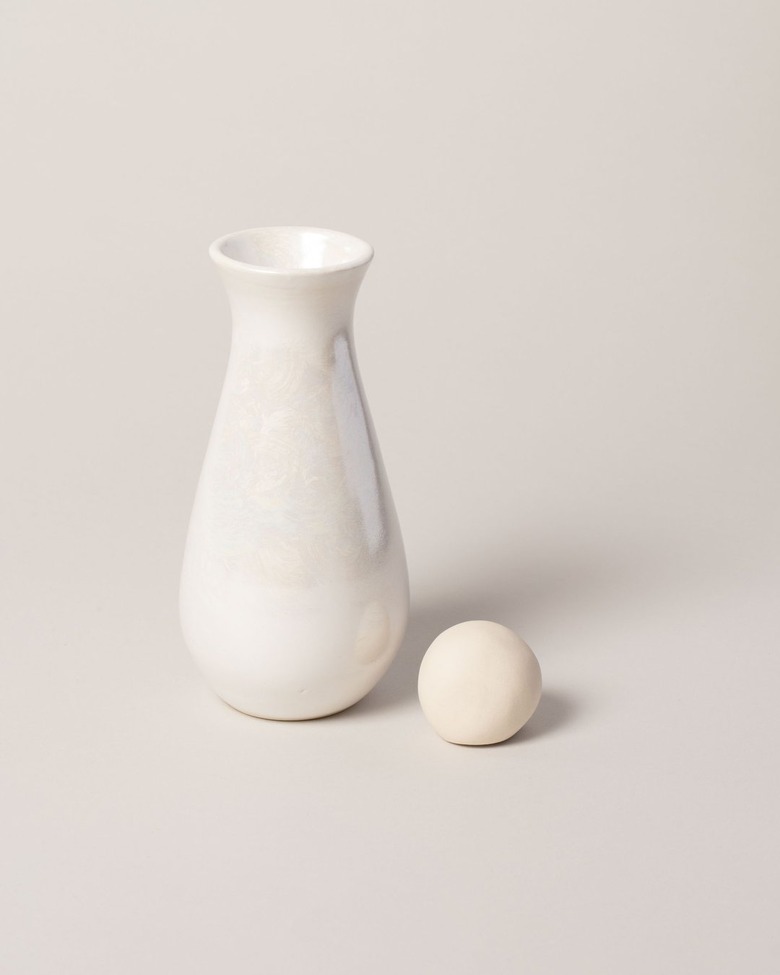 sustainable home decor with white carafe with a round stopper