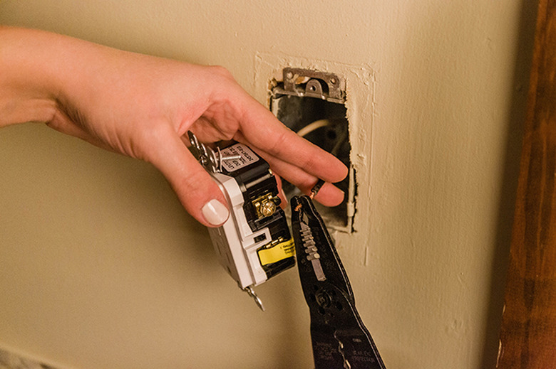 Straighten out the curved wire tip.