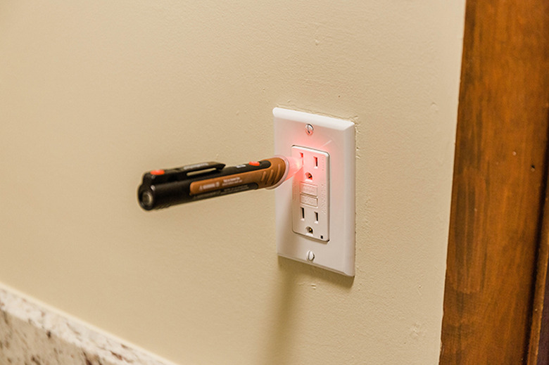 Turn the electricity back on and test to make sure your new outlet works.