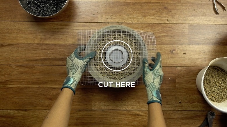 Assembling DIY concrete fire bowl.