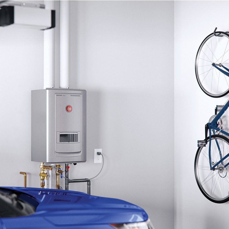 A tankless water heater installed in a garage