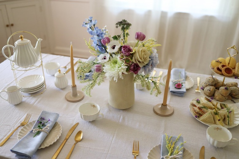 Tea party tablescape with flower centerpiece