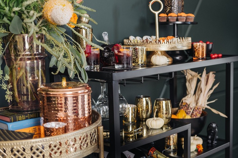 Bar cart with gold cocktail set