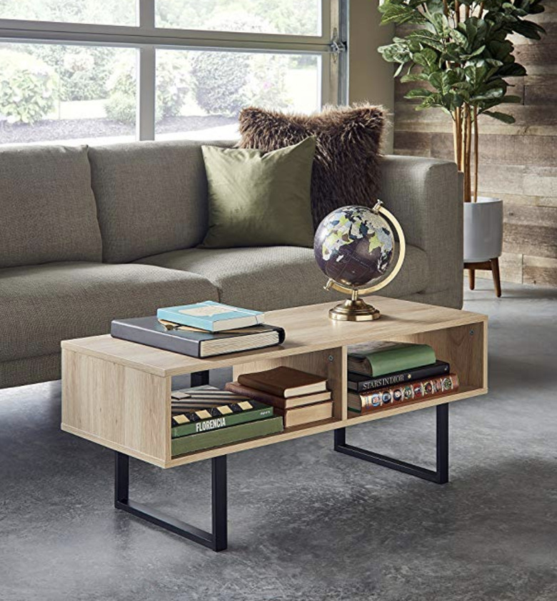 Wood coffee table with two open shelves and black metal legs