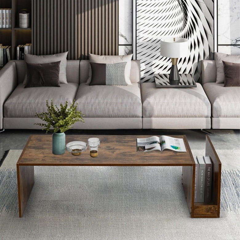 Wood coffee table with vertical side shelf for books