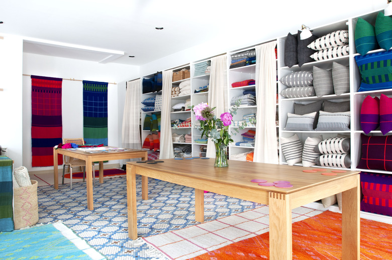 Bolé Road Textiles studio filled with textile and throw pillows