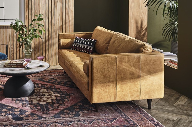 light leather sofa with stitching