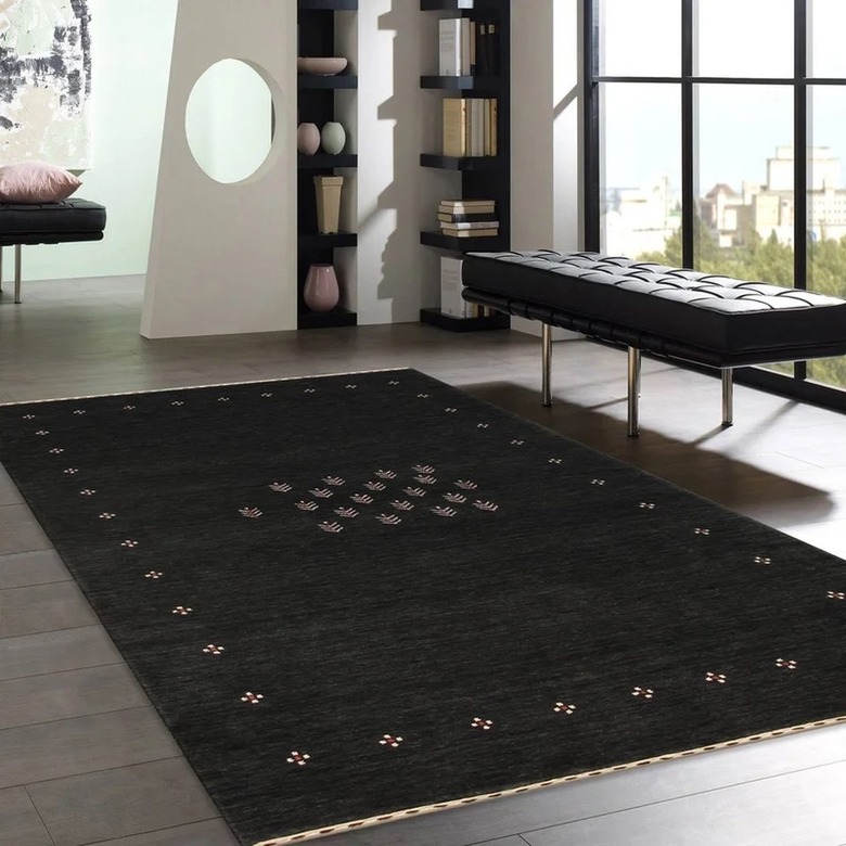 Black silk patterned rug