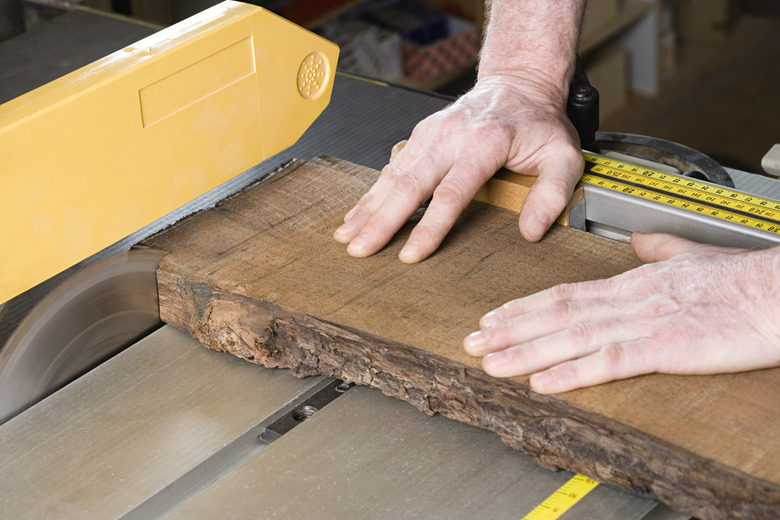 Person using table saw