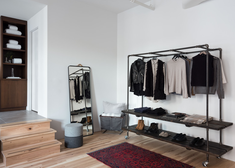 bedroom with clothing rack storage