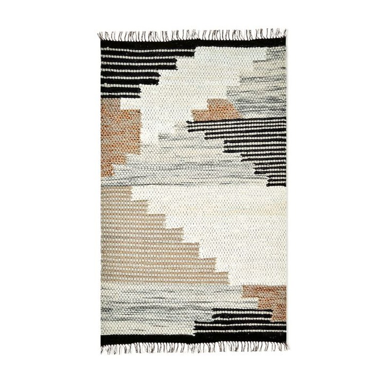 Black white and beige desert-inspired rug