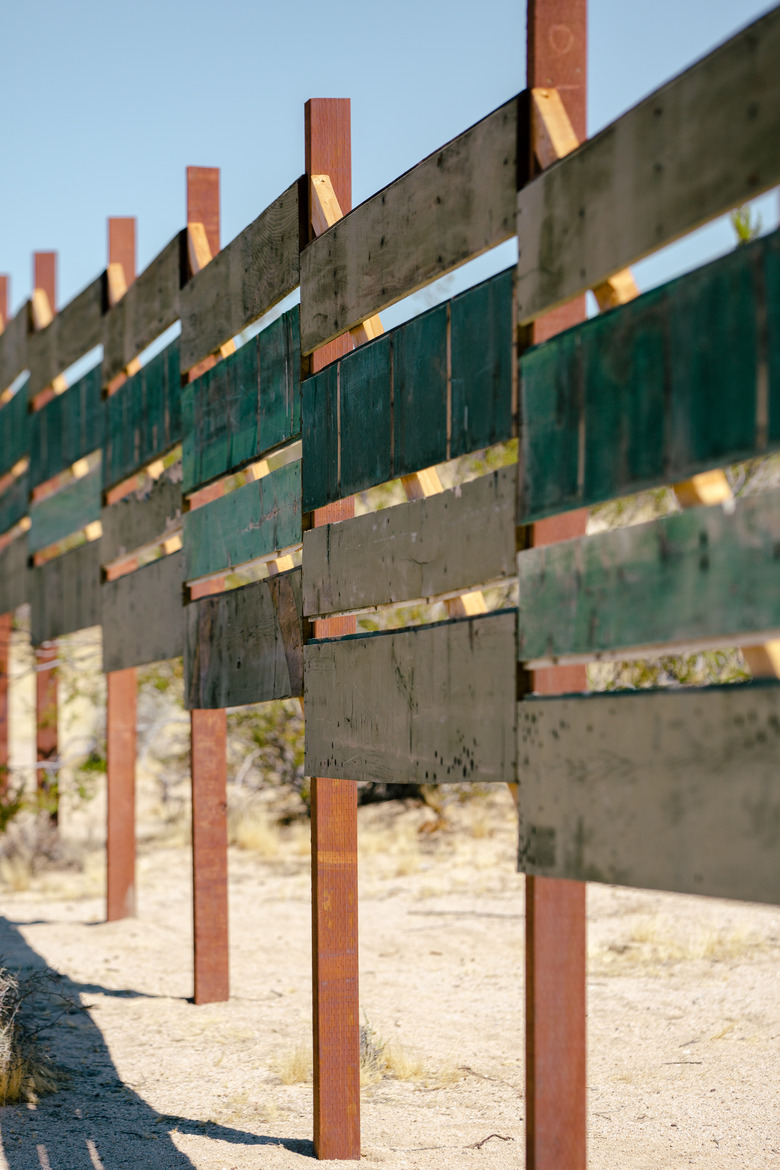 A fence built from existing scrap wood at Sonora.