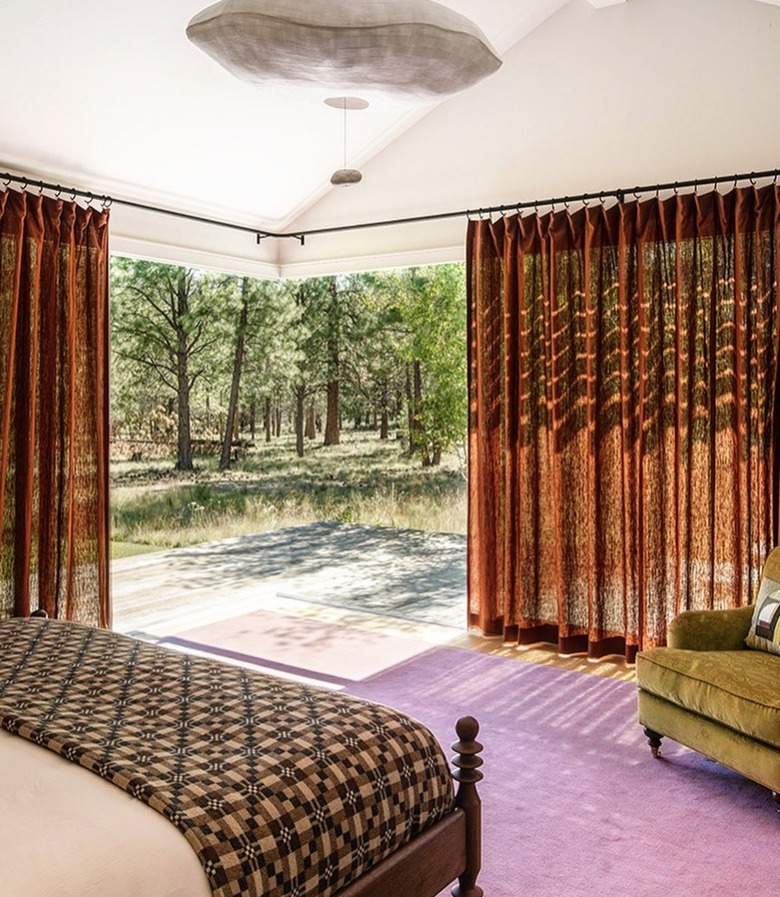 Bedroom with lilac rug
