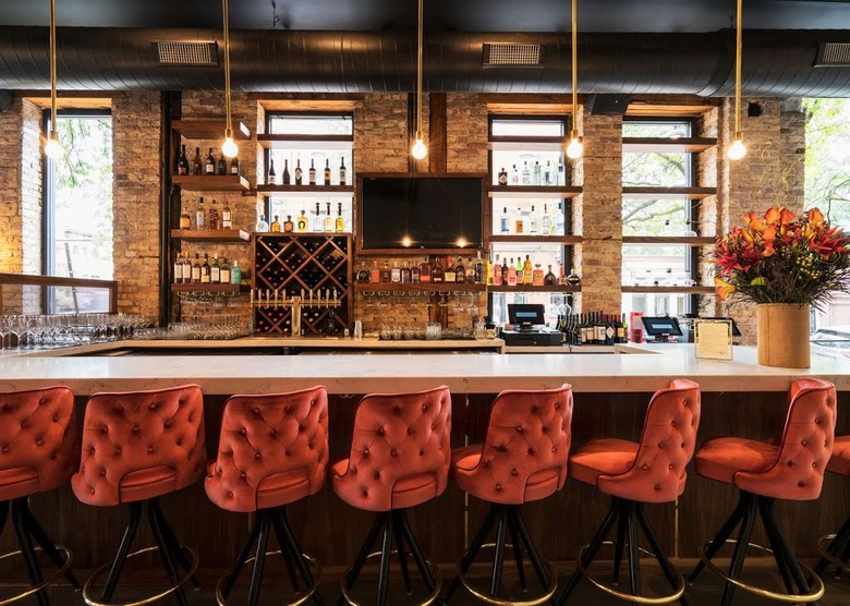 Dramatic bar with red seating