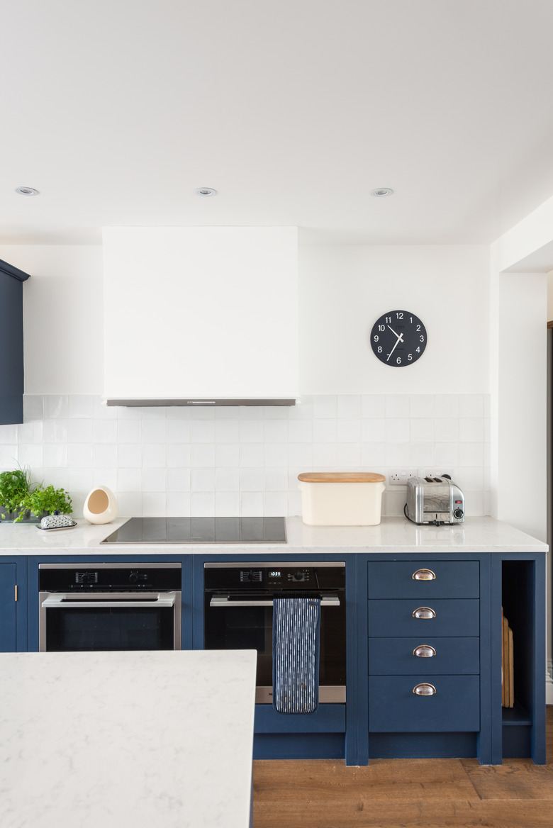 kitchen cabinets and appliances clock