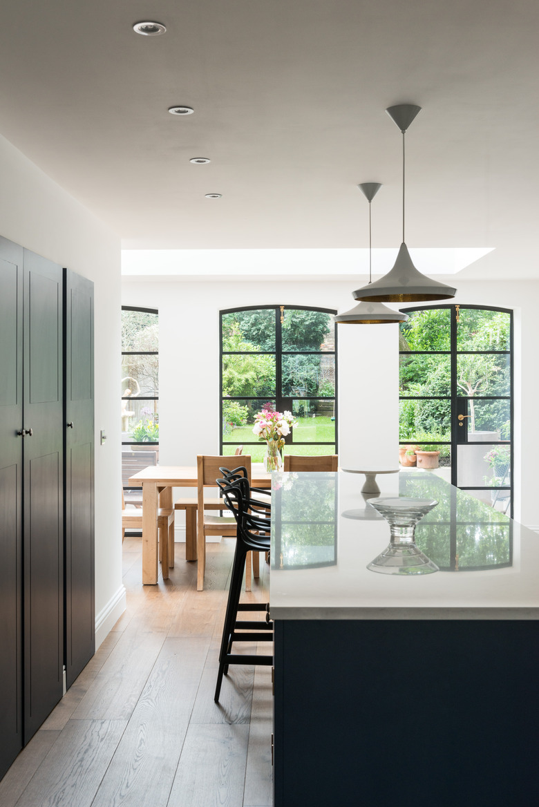 dark blue kitchen vertical hanging lights