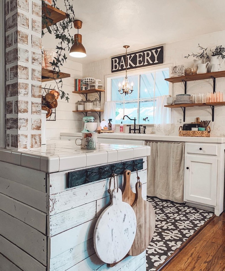 farmhouse kitchen with bakery sign and copper semi-flush mount light