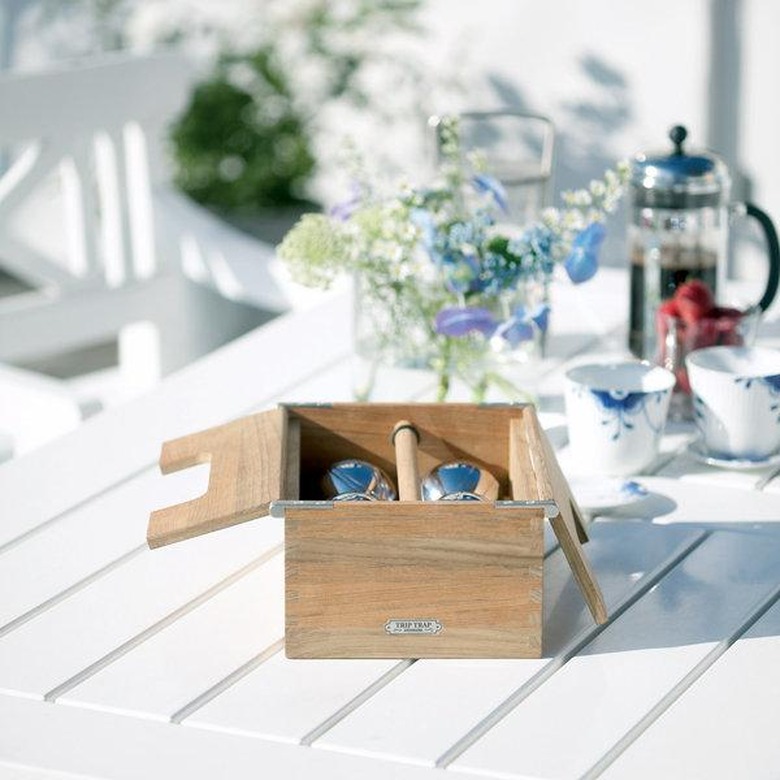 The petanque set on a white table