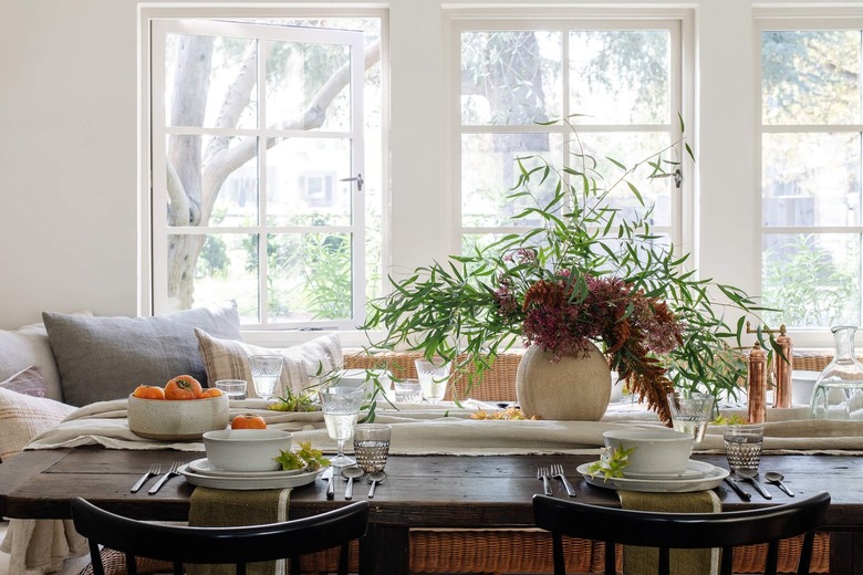 rustic place setting with rumpled linen runner