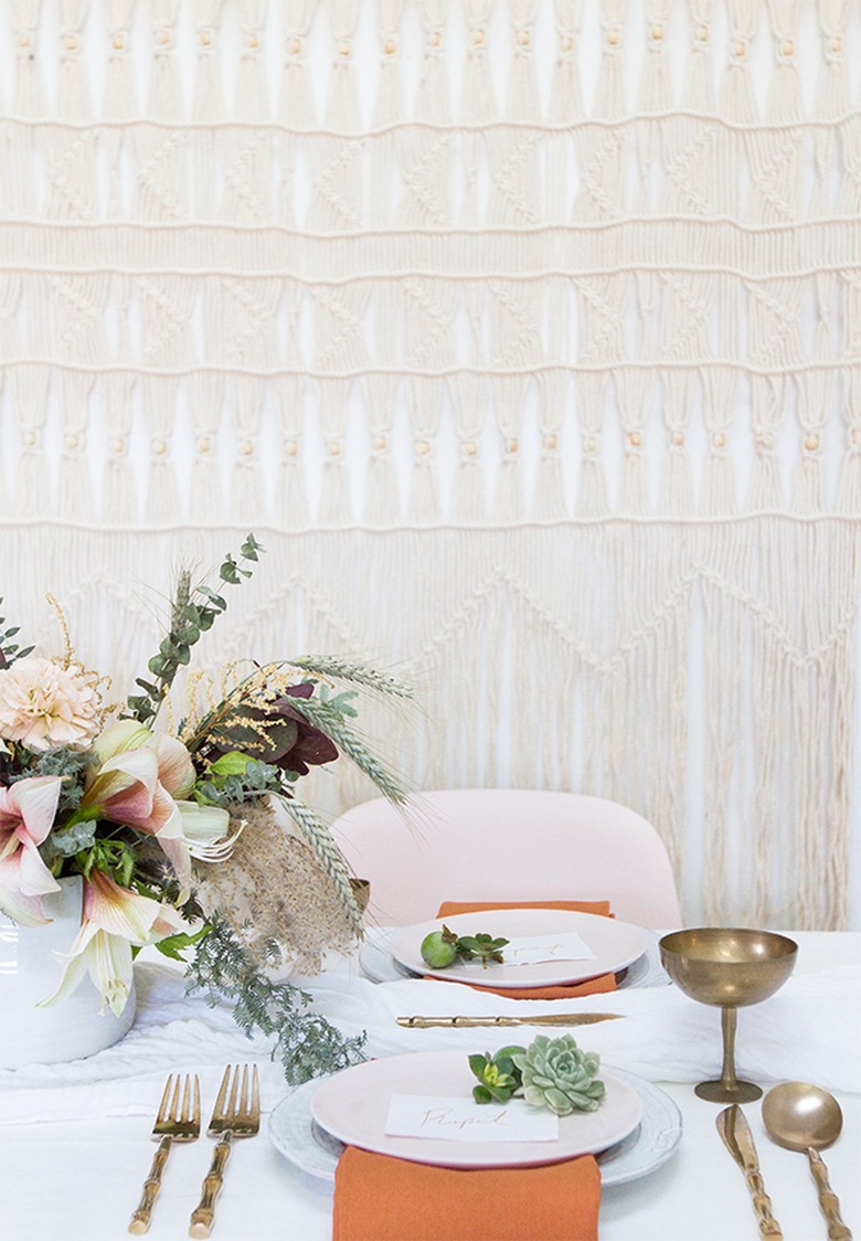 table with vintage gold silverware and coupes