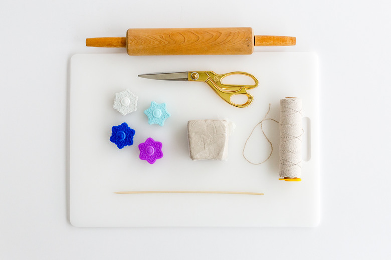 Here's what you'll need to make your DIY Stamped Air Dry Clay Christmas Ornaments.