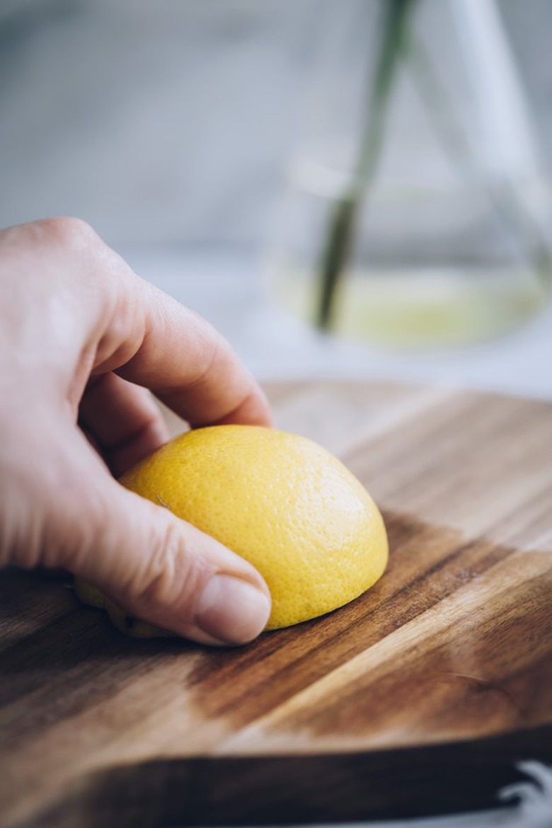 Lemon on a wood cutting board