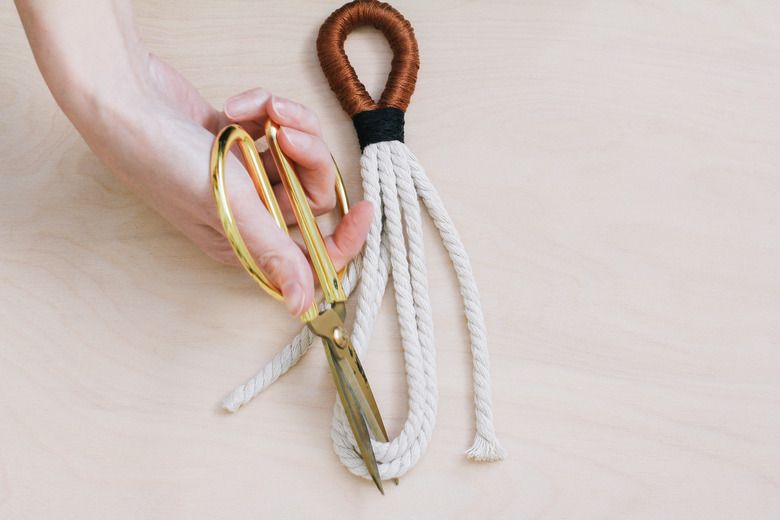 Cutting rope loops to form loose strands