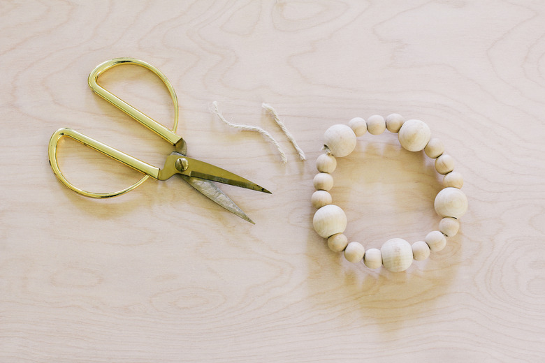 Wood beads strung together and tied into a loop