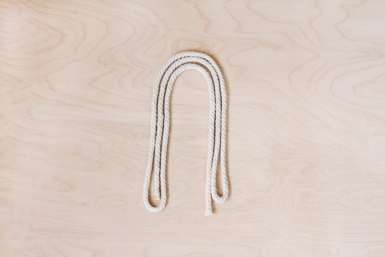 Rope folded in thirds and shaped into arch