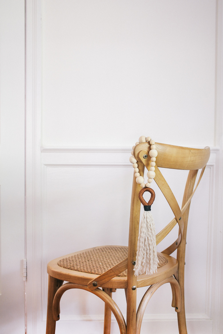 Tassel hung on back of chair