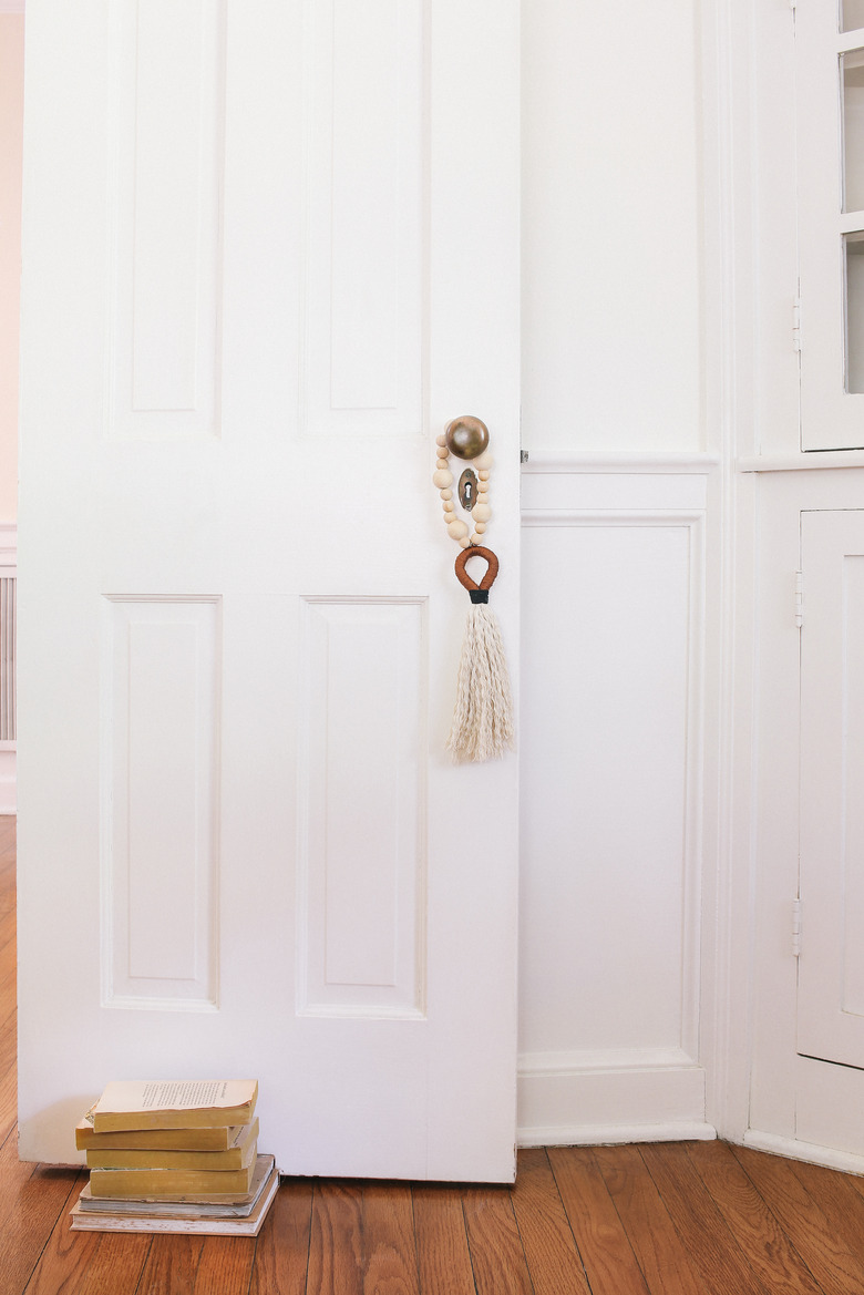 Tassel and beads hung on doorknob