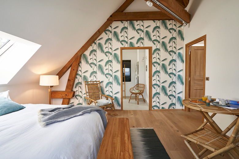 bedroom with green wallpaper