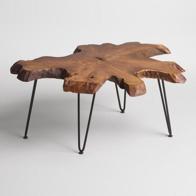 Raw-edge wooden coffee table with black metal legs