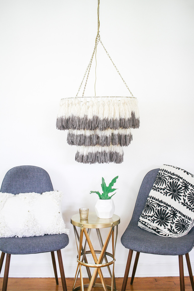 Dip-dyed tassel chandelier hanging in living room