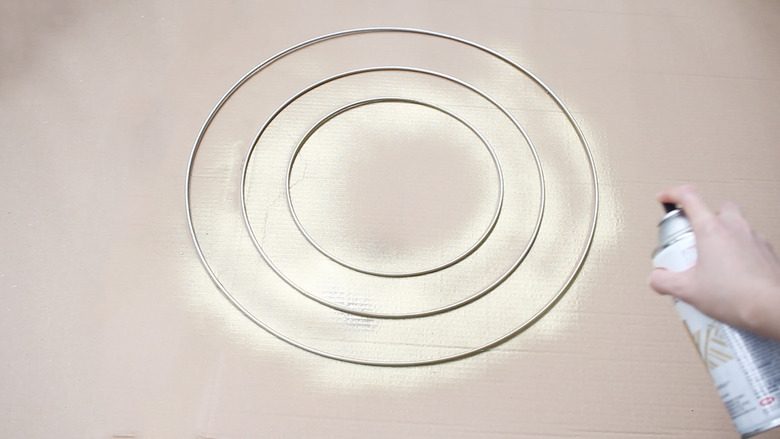Spray painting floral hoops brass