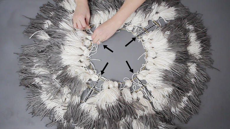 Tying three hoops together