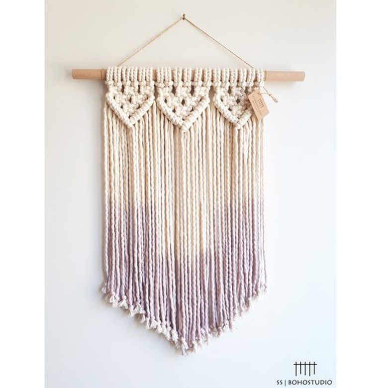 Dip-dyed woven wall hanging. Top half is beige