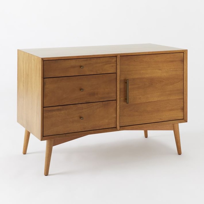 Mid-century media console with three drawers and one cupboard in medium finish